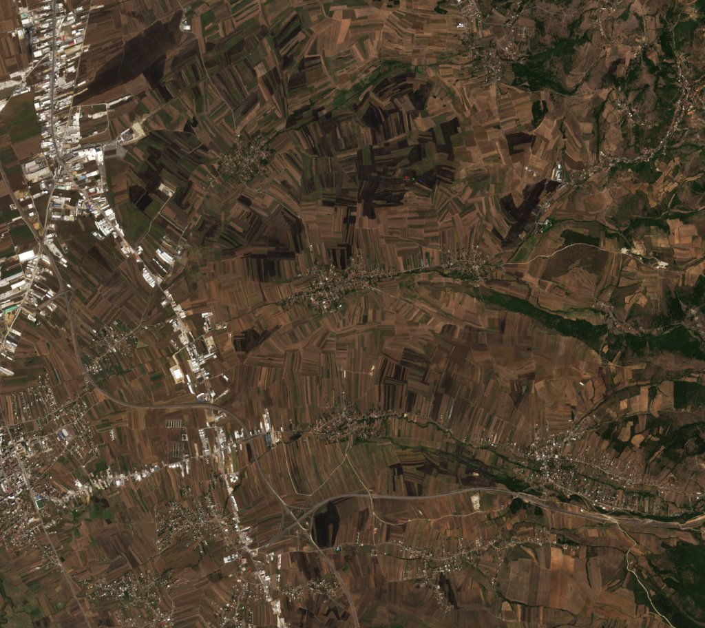 Leégett terület műholdról — Pristina