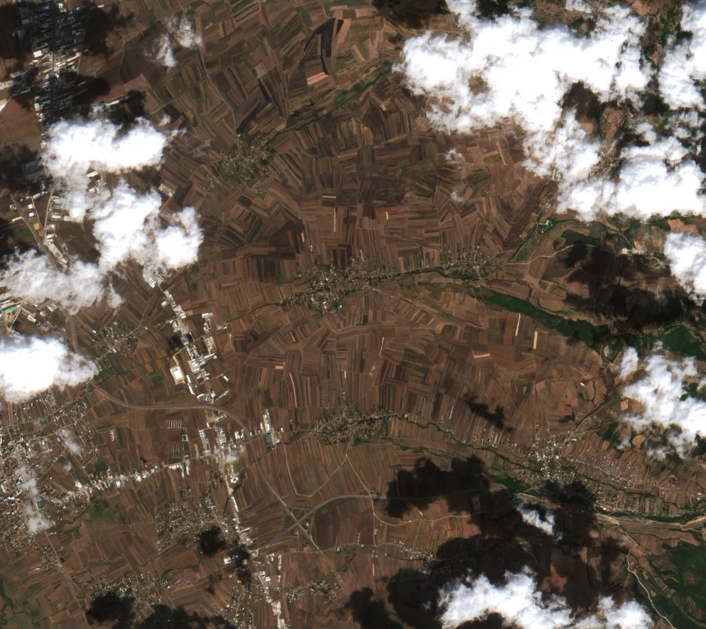 Leégett terület műholdról — Pristina